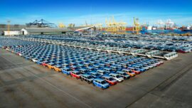 Aerial view a lot of new car for import and export shipping by s