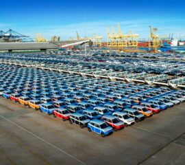 Aerial view a lot of new car for import and export shipping by s